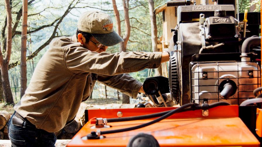 Woodworker Tak Yoshino using LT15 portable sawmill